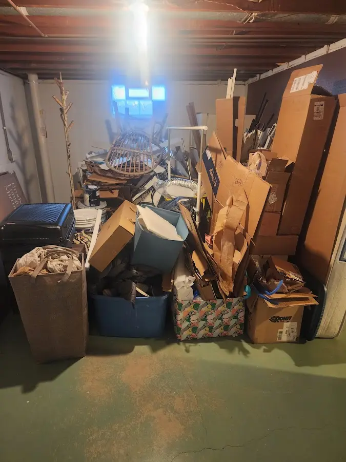 Roll-off dumpster container at job site for Concrete Dumpster Rental in Woods Cross